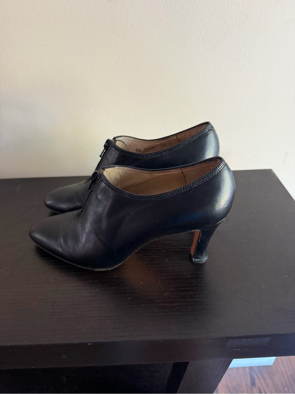 Martinez Valero black leather front-zip heeled ankle booties with pointed toes